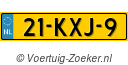 21KXJ9
